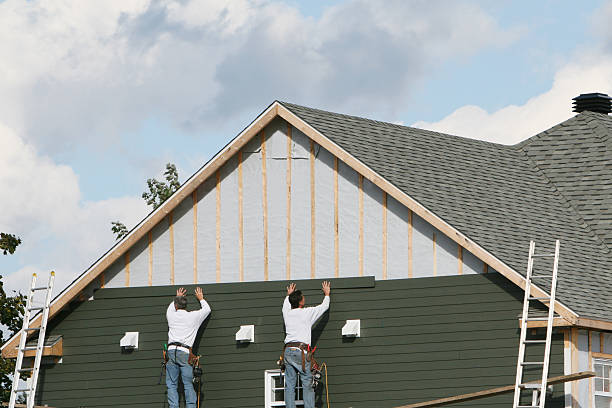 Professional Vinyl Siding technician working in Enon, OH